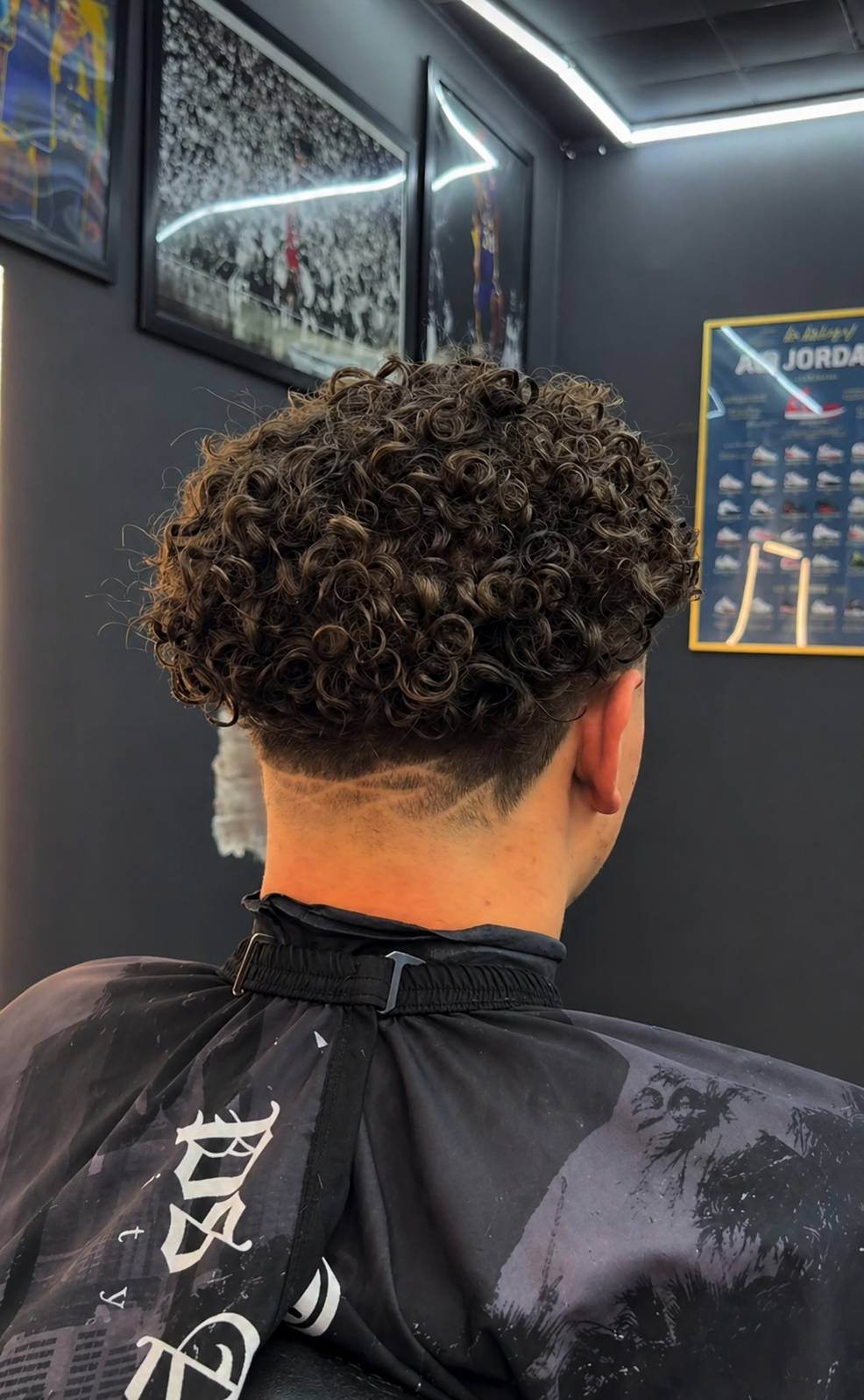 Textured top with low taper fade at Sayless Fadez